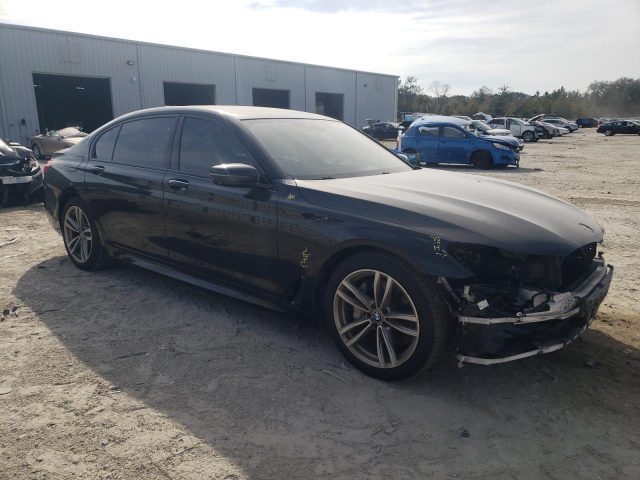 2017 BMW 7er VIN WBA7E2C51HG739803 Copart auction photo, front end damage thumbnail 4