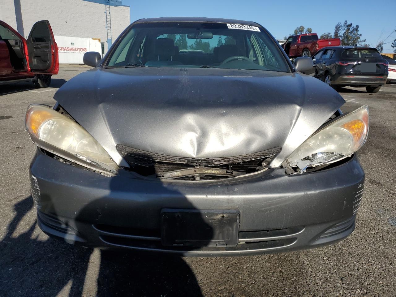 2004 Toyota Camry VIN 4T1BE32KX4U869760 Copart auction photo, front end / side damage thumbnail 5