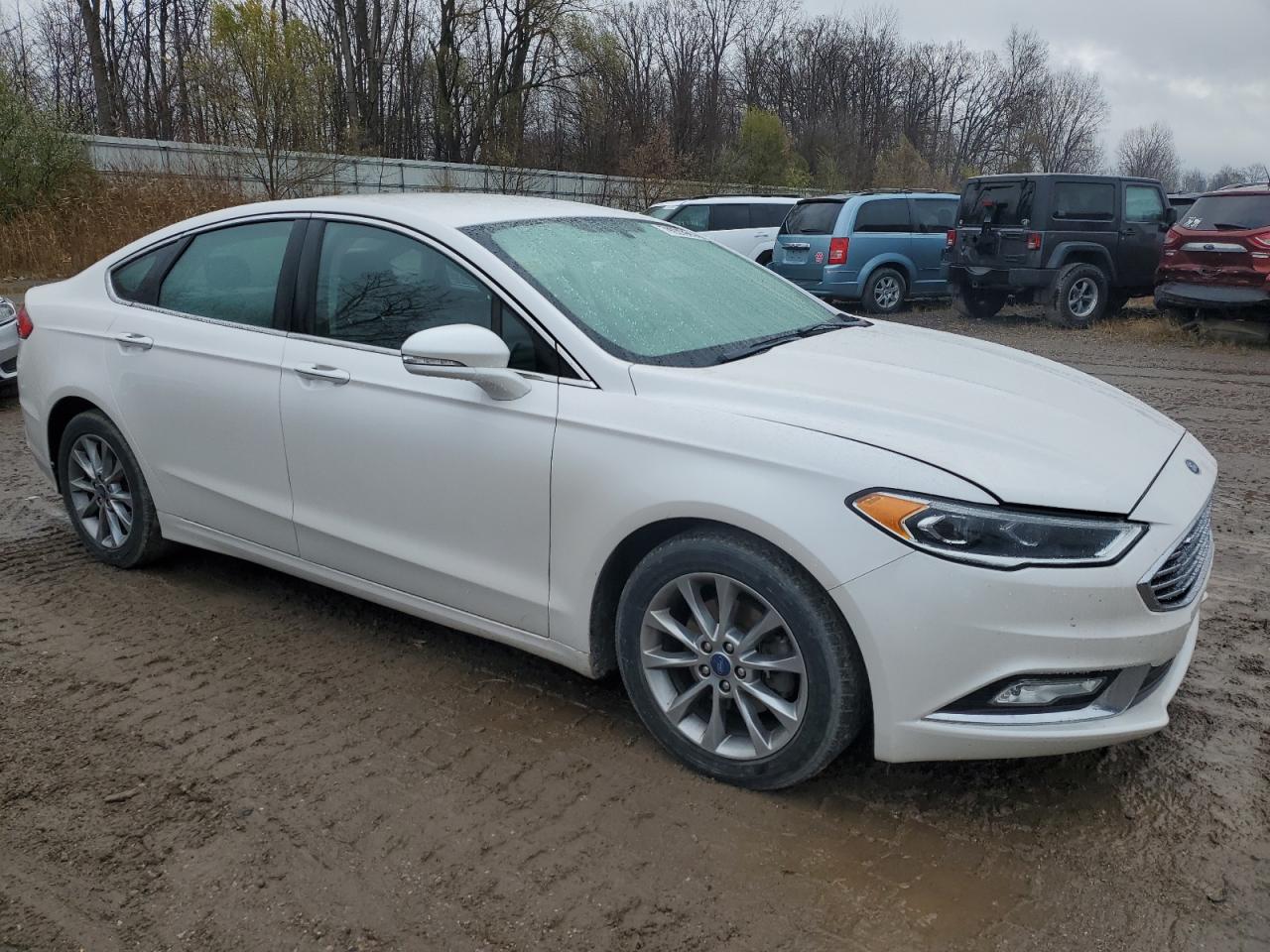2017 Ford Fusion VIN 3FA6P0HDXHR405734 Copart auction photo, front end / side damage thumbnail 4