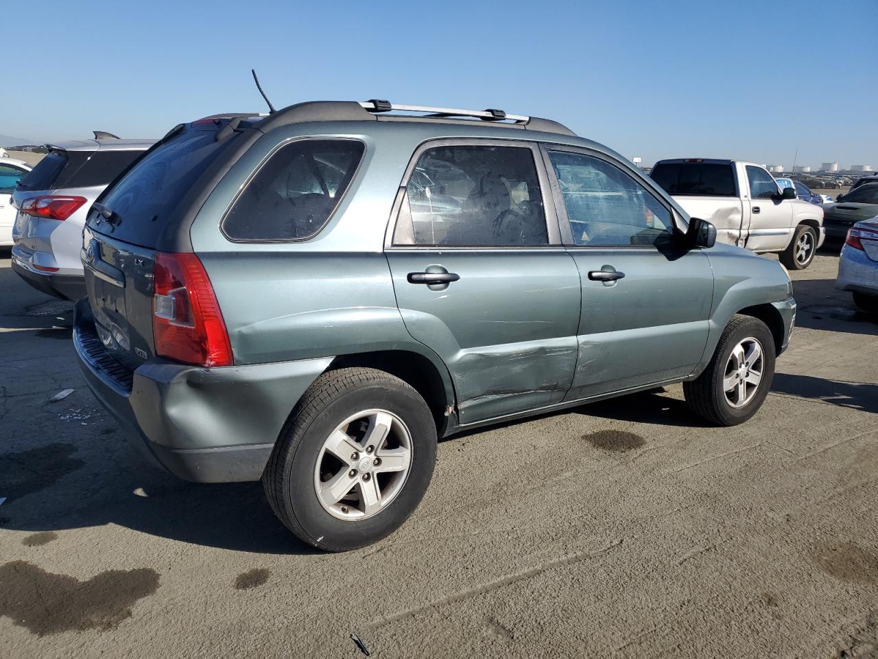 2009 KIA Sportage VIN KNDJE723897611677 Copart auction photo, all over damage thumbnail 3