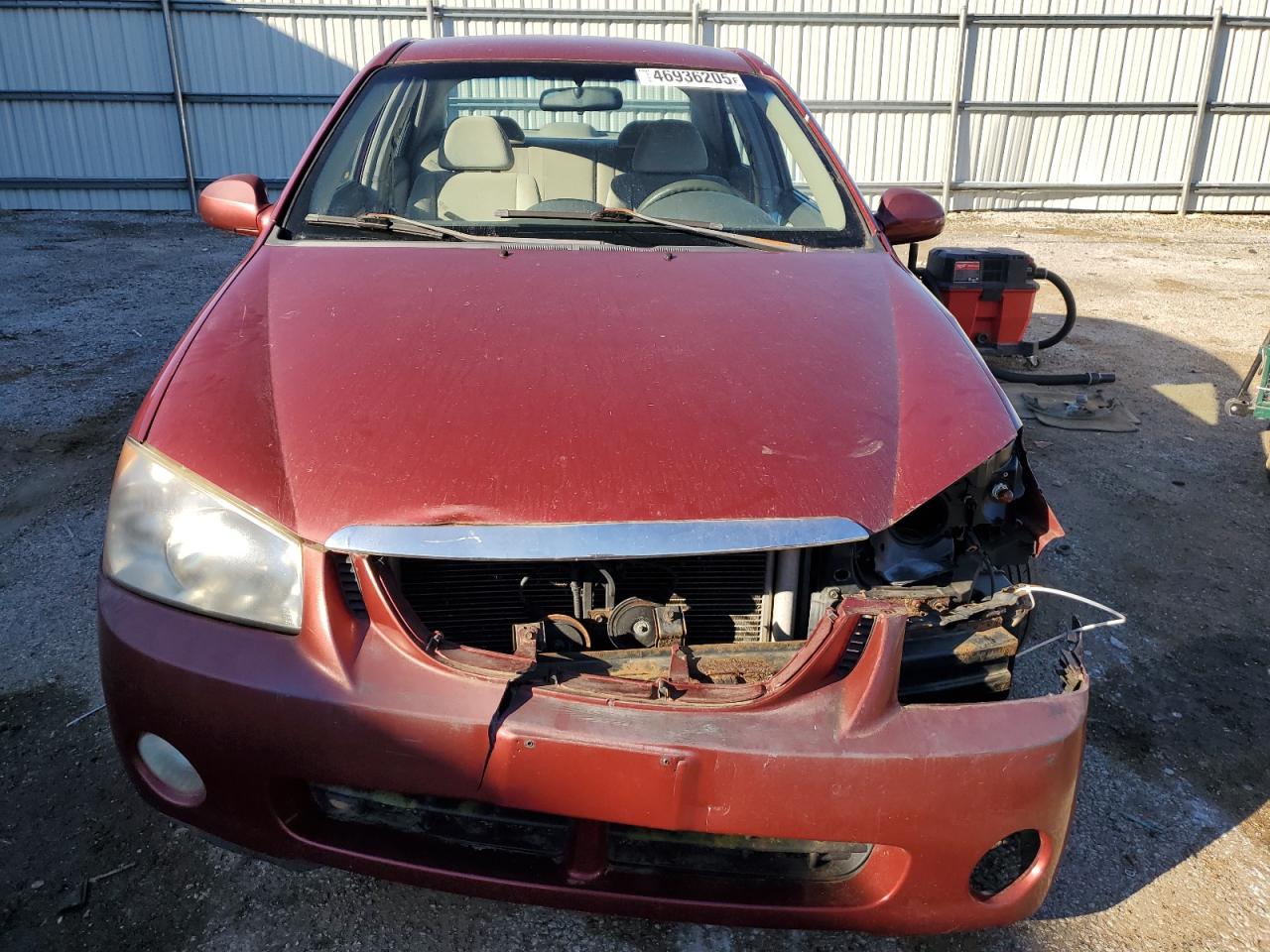 2004 KIA Spectra VIN KNAFE121345025861 Copart auction photo, front end / side damage thumbnail 5