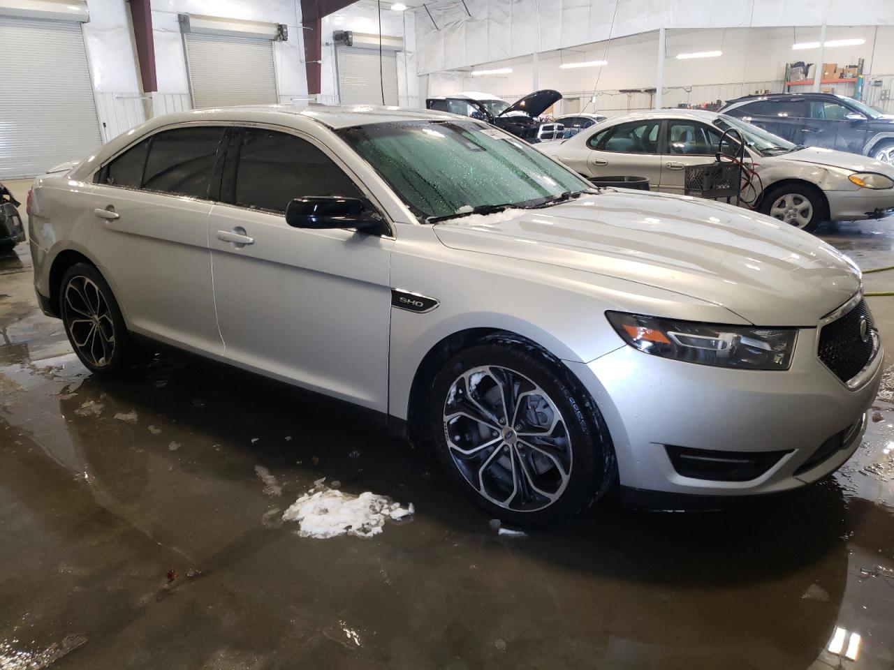 2015 Ford Taurus VIN 1FAHP2KT1FG113964 Copart auction photo, front end / side damage thumbnail 4