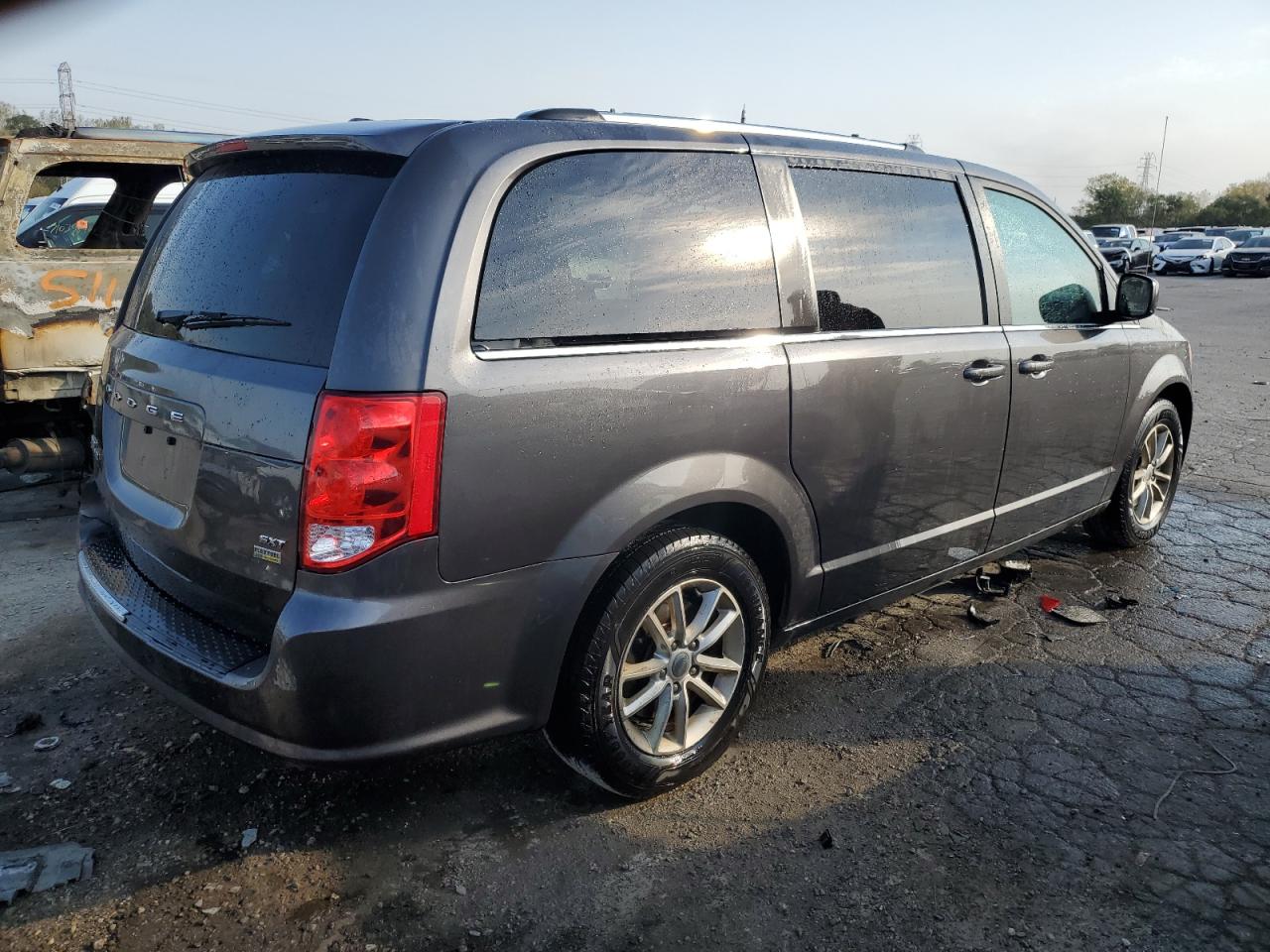 2019 Dodge Caravan VIN 2C4RDGCG9KR775404 Copart auction photo, side / rear end damage thumbnail 3