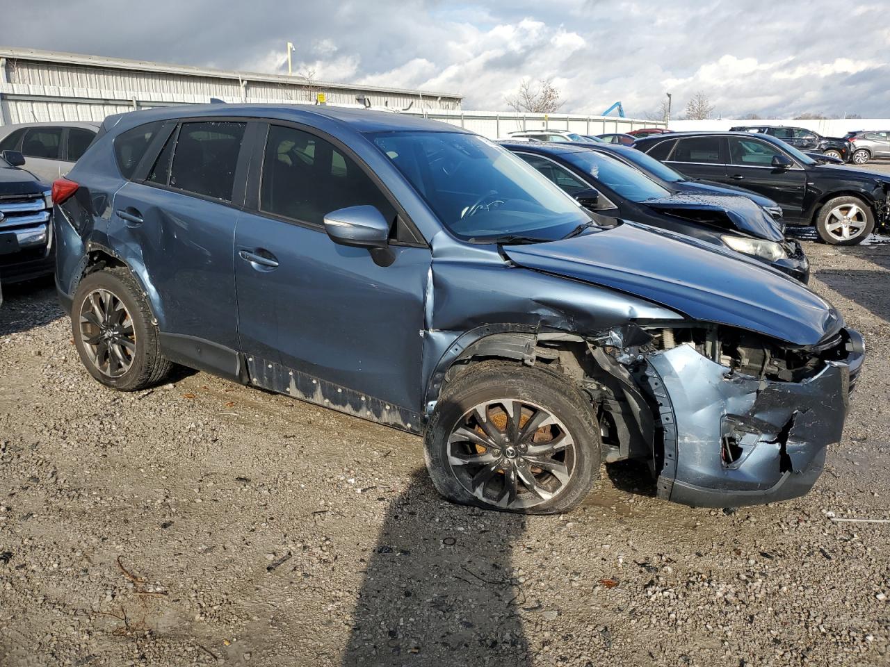 2016 Mazda CX-5 VIN JM3KE4DY5G0721594 Copart auction photo, all over damage thumbnail 4