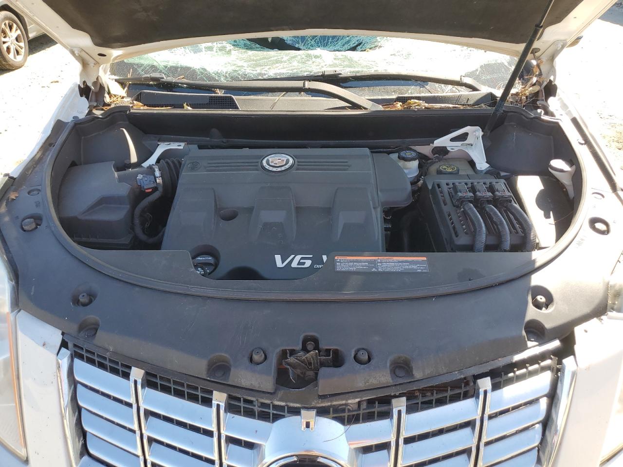 2013 Cadillac SRX VIN 3GYFNCE39DS516690 Copart auction photo, top/roof / front end damage thumbnail 12