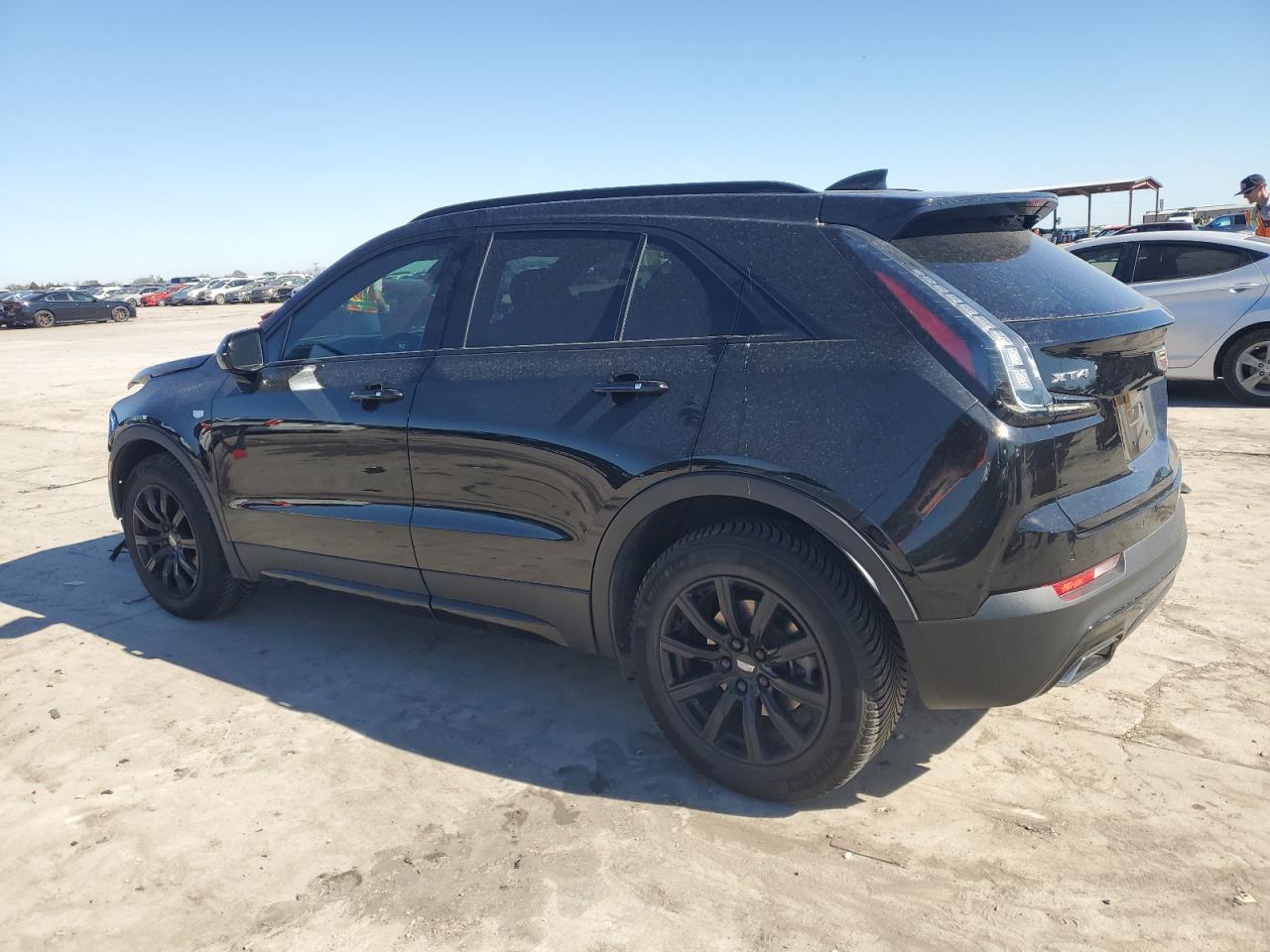 2019 Cadillac XT4 VIN 1GYFZER49KF199403 Copart auction photo, front end / hail damage thumbnail 2