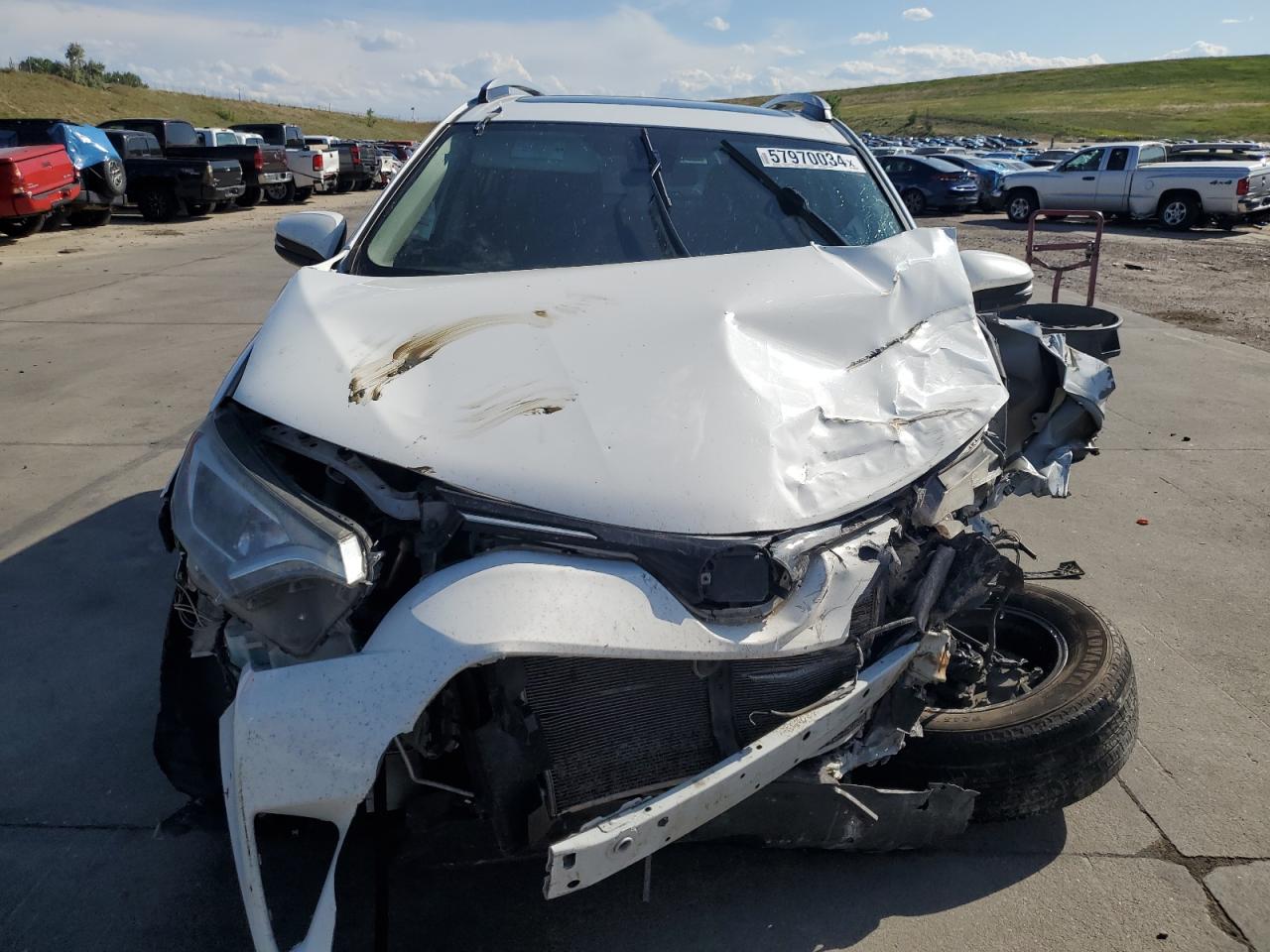 2018 Toyota RAV 4 VIN 2T3RFREV0JW738229 Copart auction photo, front end / undercarriage damage thumbnail 5