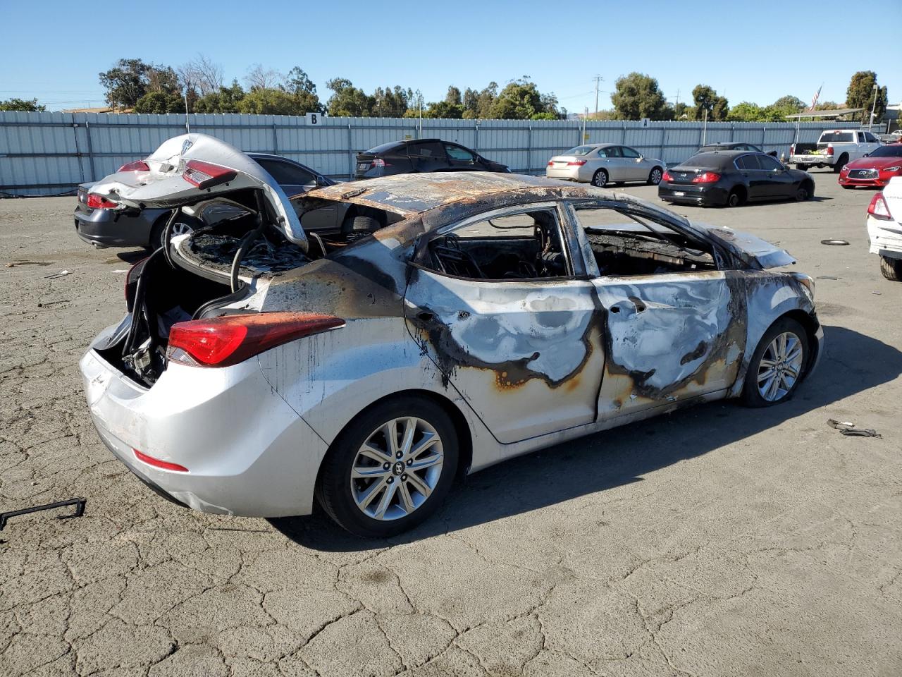 2015 Hyundai Elantra VIN KMHDH4AE4FU303114 Copart auction photo, burn damage thumbnail 3