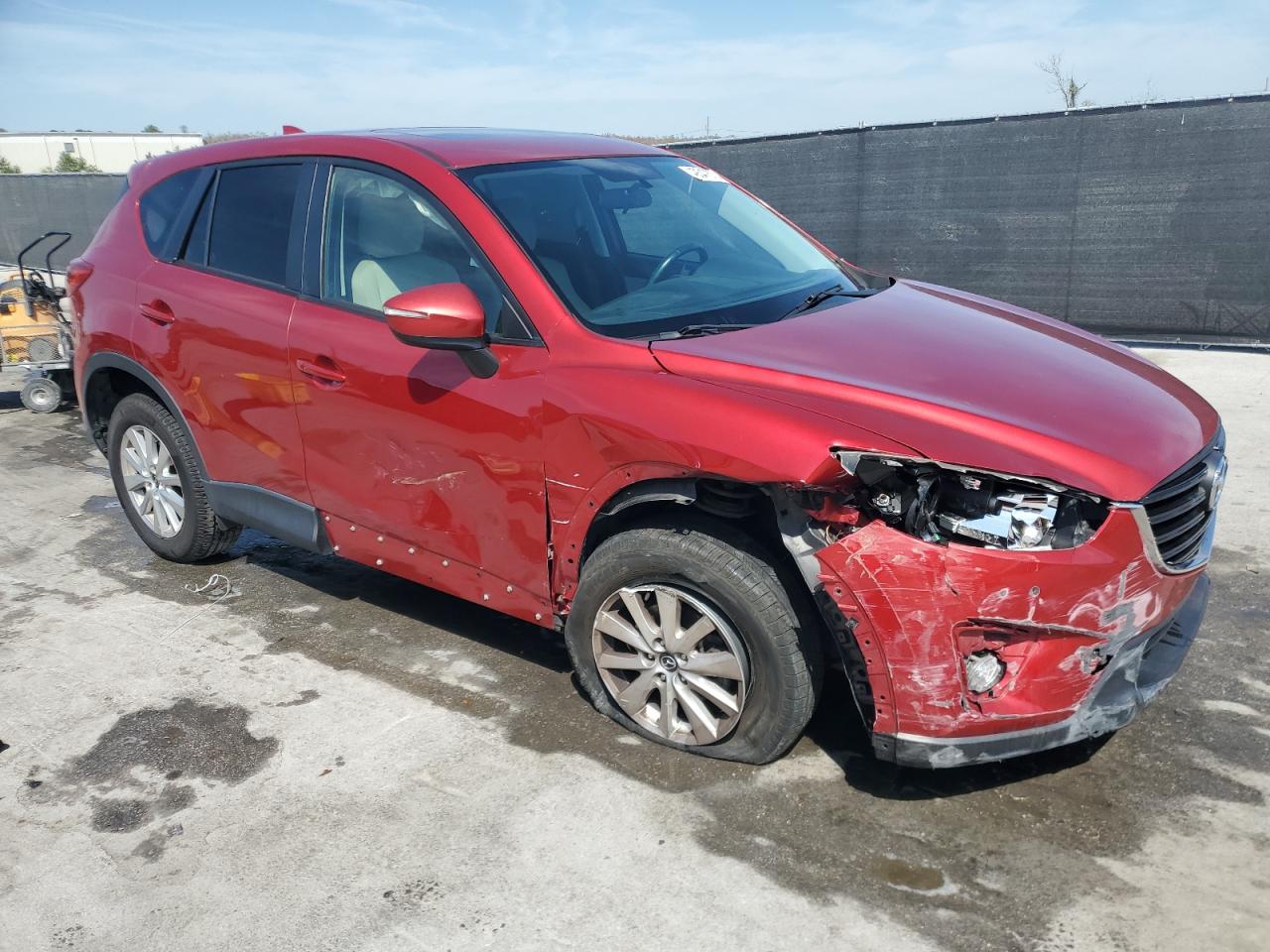2016 Mazda CX-5 VIN JM3KE2CY6G0780630 Copart auction photo, front end / side damage thumbnail 4