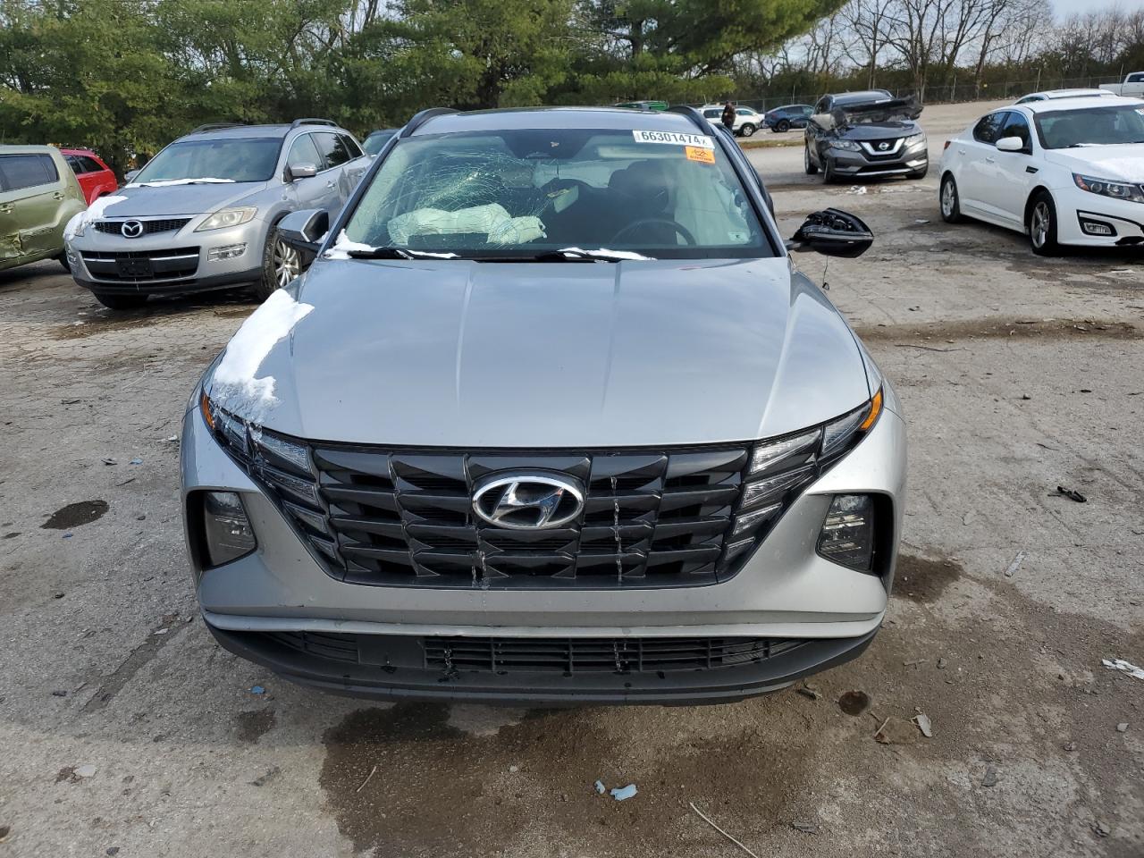 2022 Hyundai Tucson VIN 5NMJFCAE6NH063304 Copart auction photo, all over damage thumbnail 5