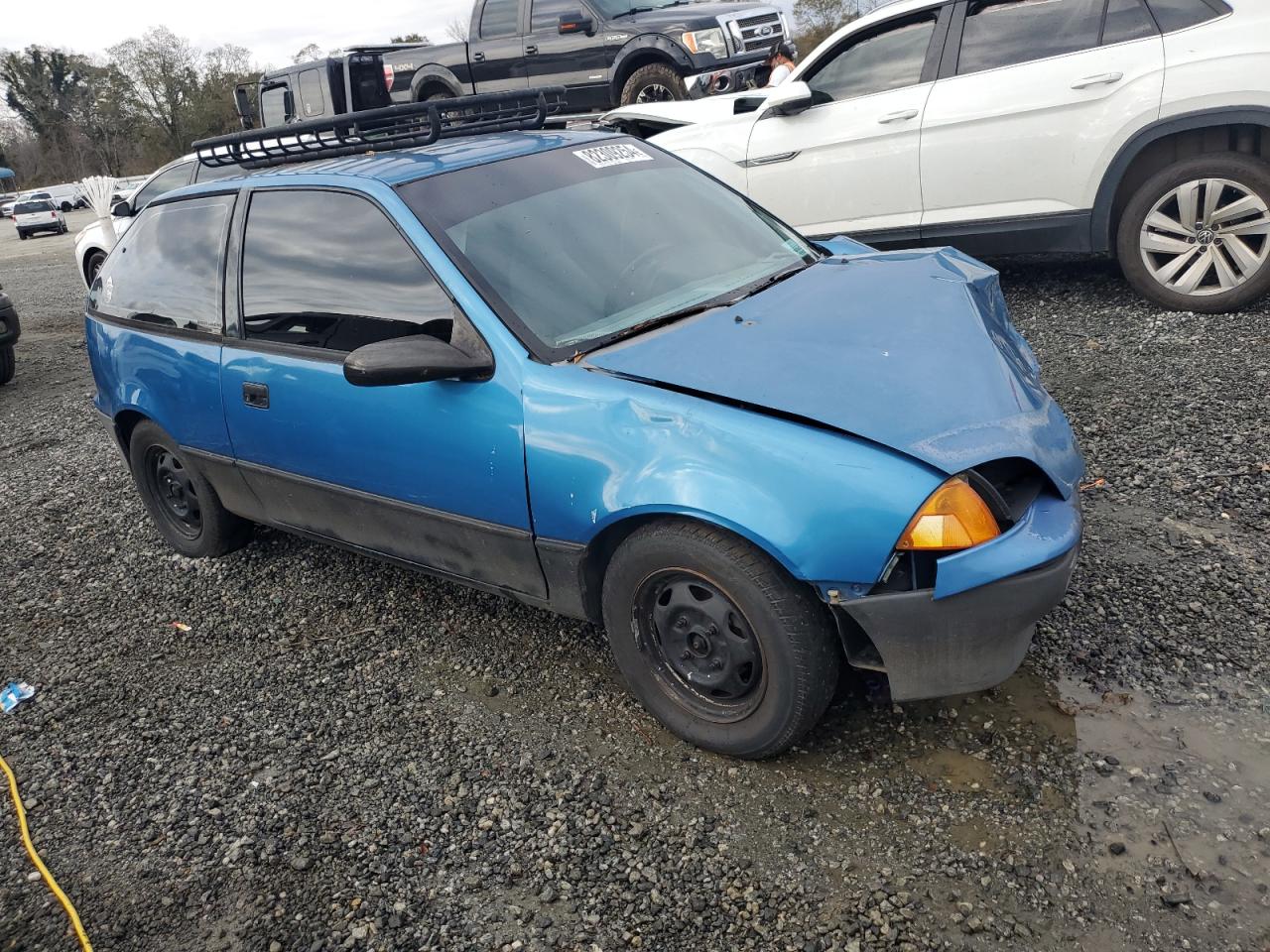 1990 GEO Metro VIN 2C1MR2465L6014681 Copart auction photo, front end damage thumbnail 4