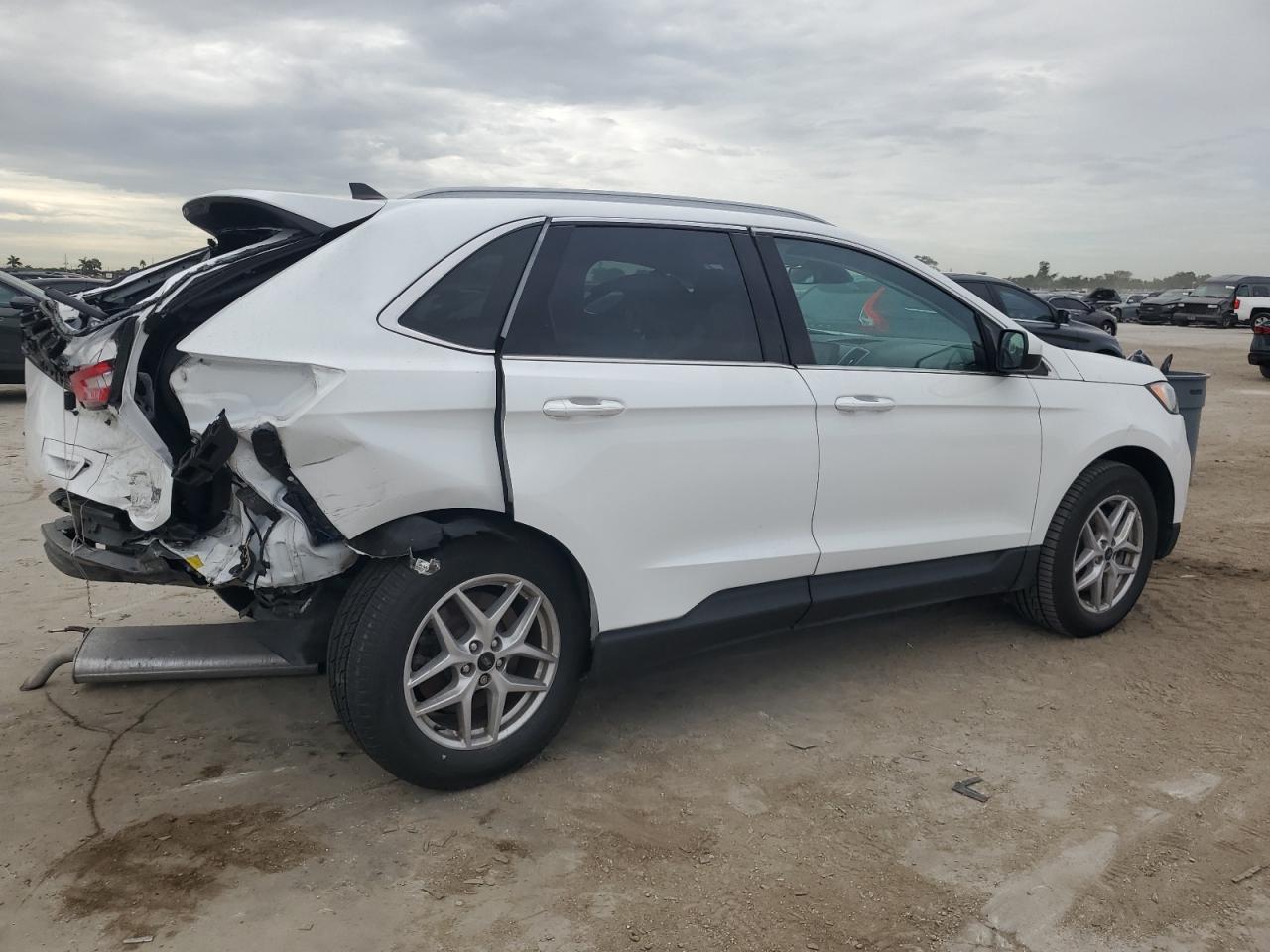 2023 Ford Edge VIN 2FMPK4J99PBA41566 Copart auction photo, rear end damage thumbnail 3