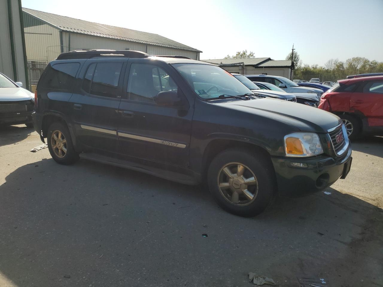 2002 GMC Envoy VIN 1GKET16S726133001 Copart auction photo, rear end damage thumbnail 4