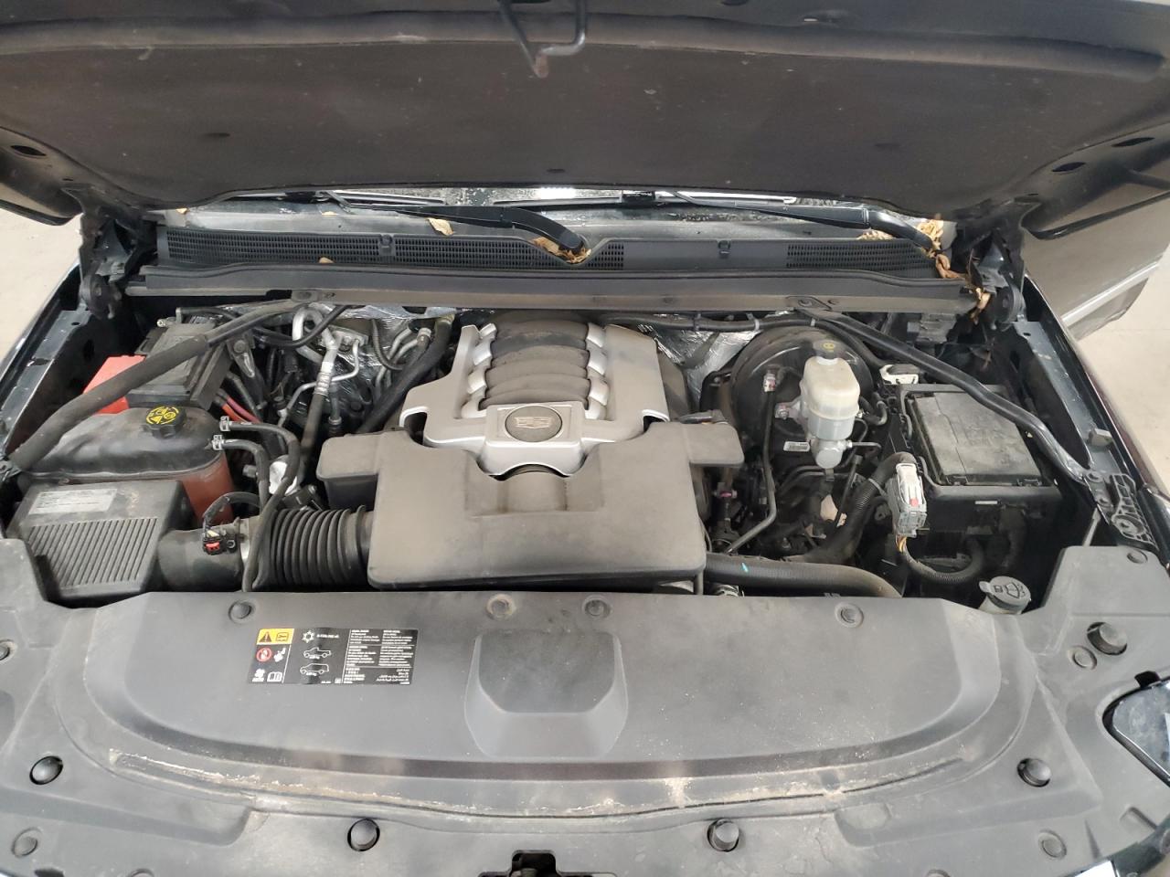2015 Cadillac Escalade VIN 1GYS4MKJXFR610965 Copart auction photo, all over damage thumbnail 12