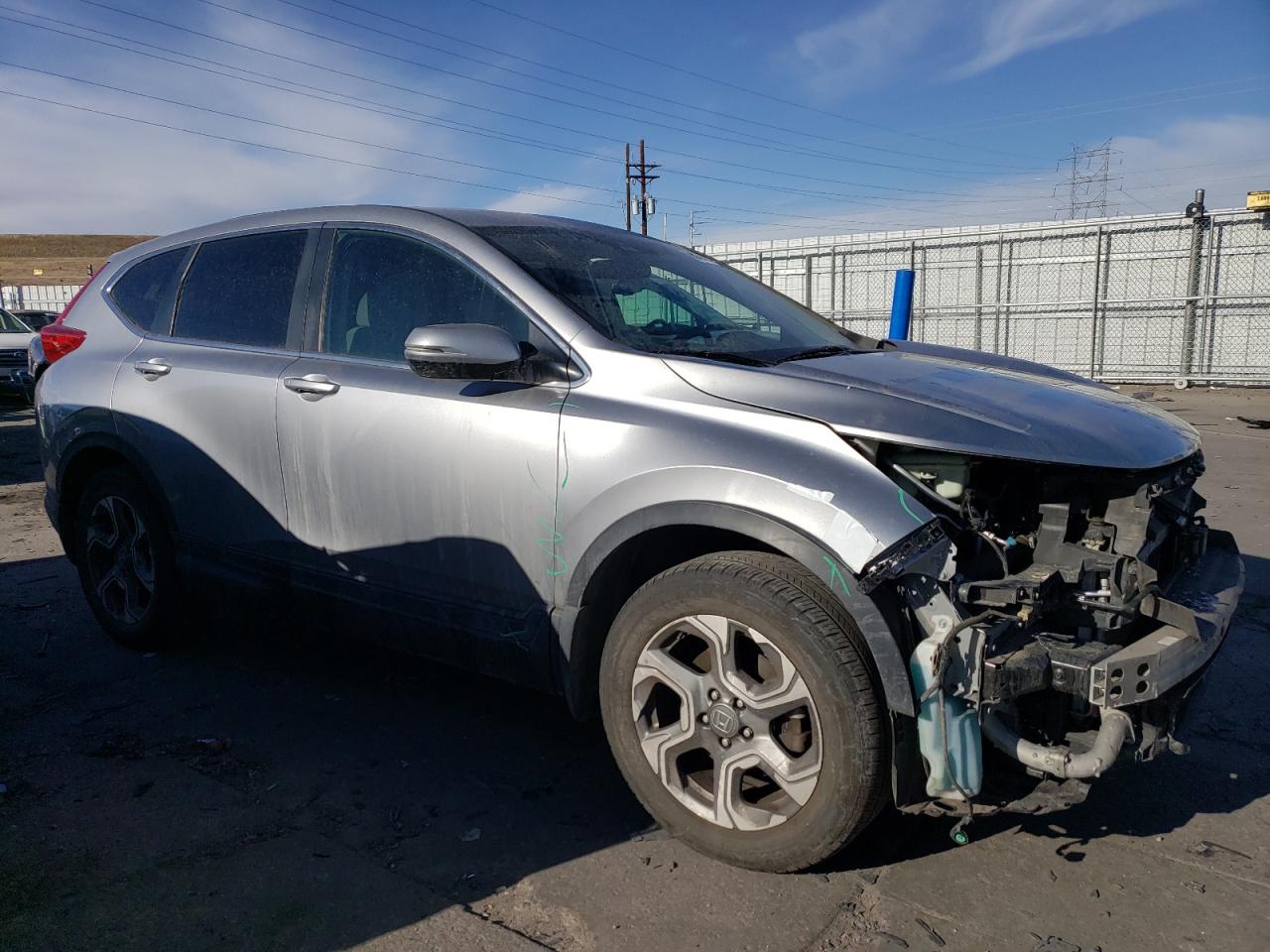 2017 Honda CR-V VIN 2HKRW2H5XHH665696 Copart auction photo, front end / hail damage thumbnail 4