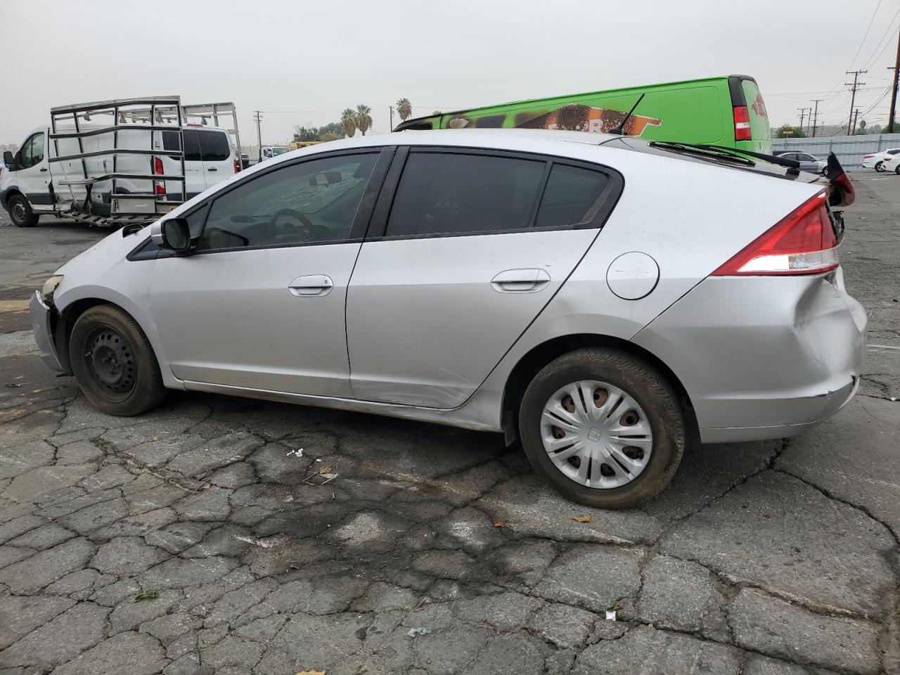 2010 Honda Insight VIN JHMZE2H56AS043184 Copart auction photo, all over damage thumbnail 2