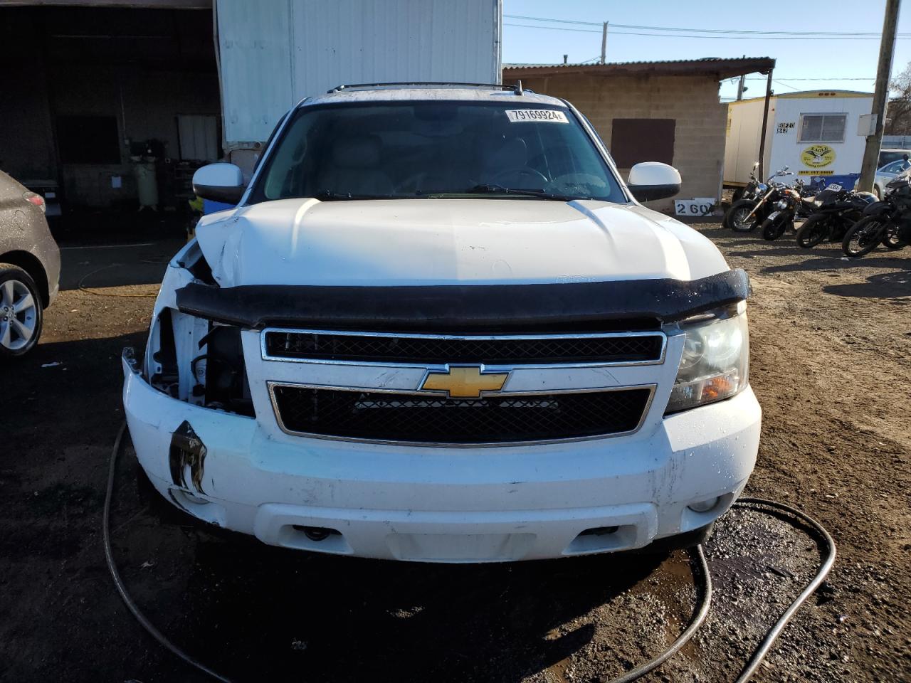2011 Chevrolet Tahoe VIN 1GNSKBE01BR324622 Copart auction photo, front end / minor dent/scratches damage thumbnail 5