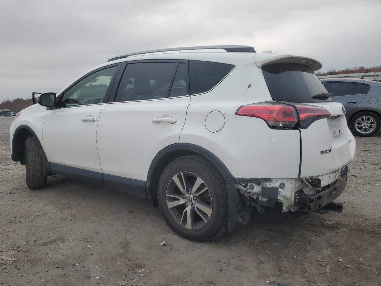 2018 Toyota RAV 4 VIN JTMRFREV3JD229488 Copart auction photo, rear end / side damage thumbnail 2