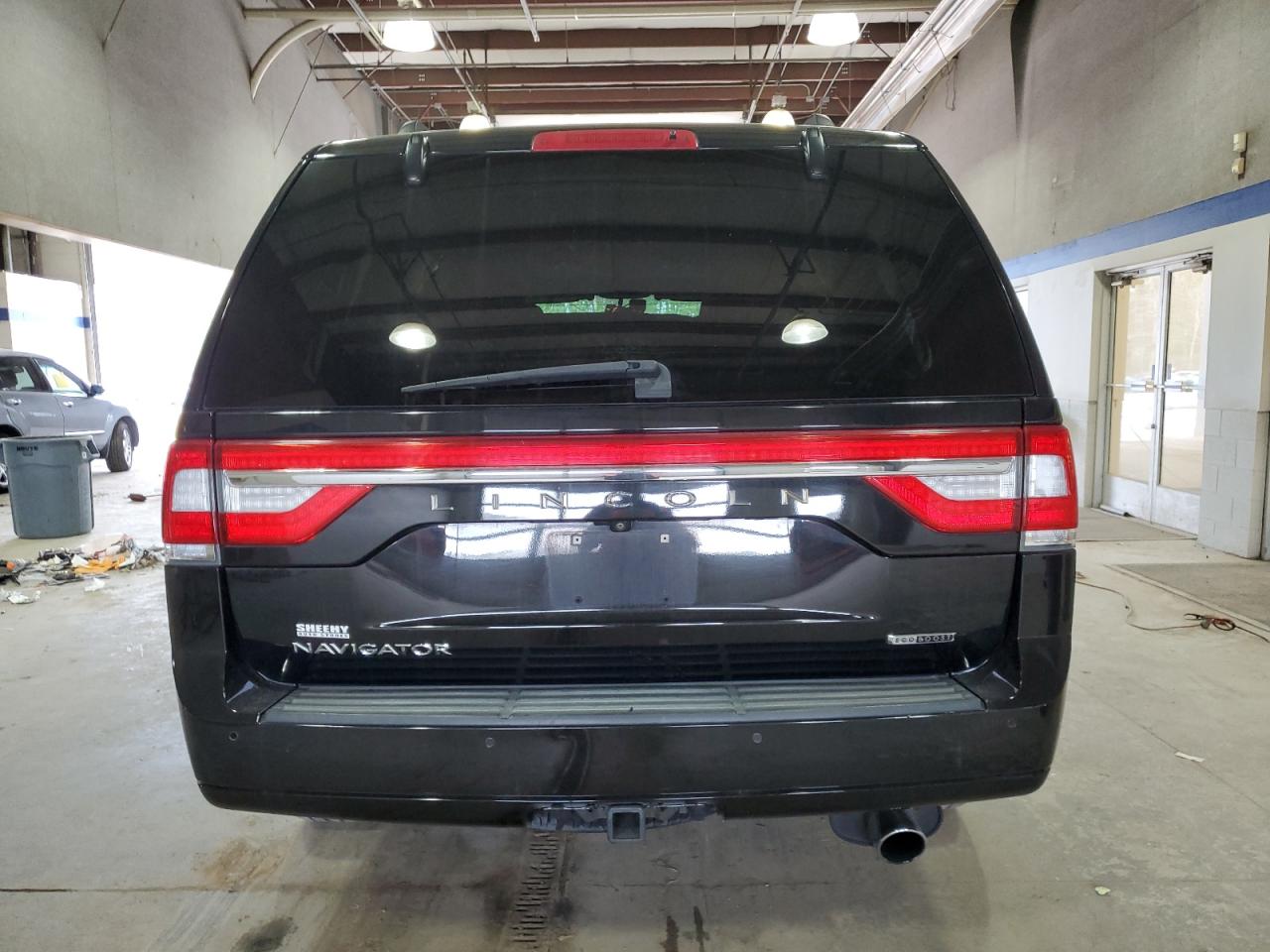 2015 Lincoln Navigator VIN 5LMJJ2JT9FEJ04044 Copart auction photo, top/roof damage thumbnail 6
