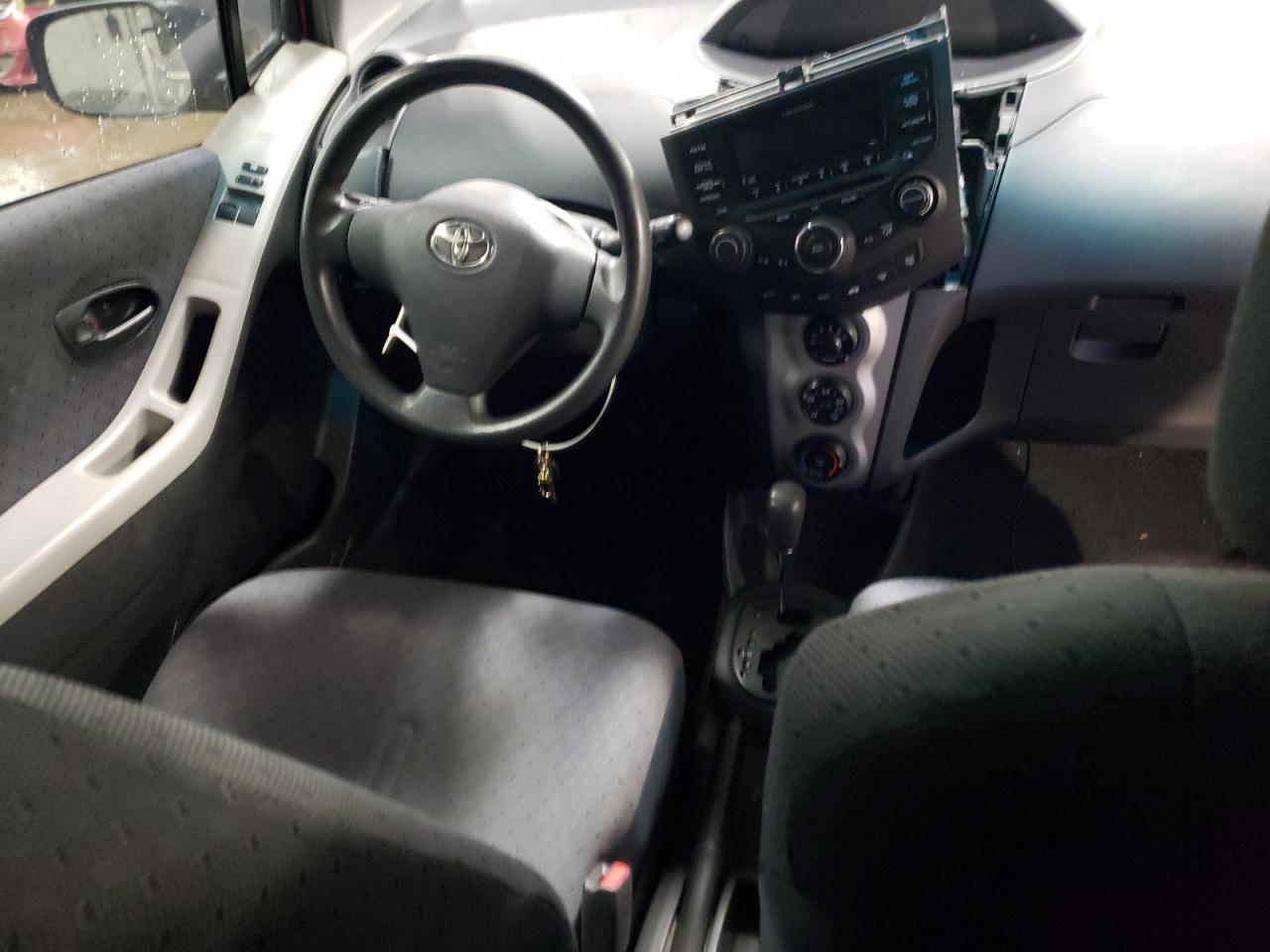 2009 Toyota Yaris VIN JTDJT903195255931 Copart auction photo, water/flood / rear end damage thumbnail 8