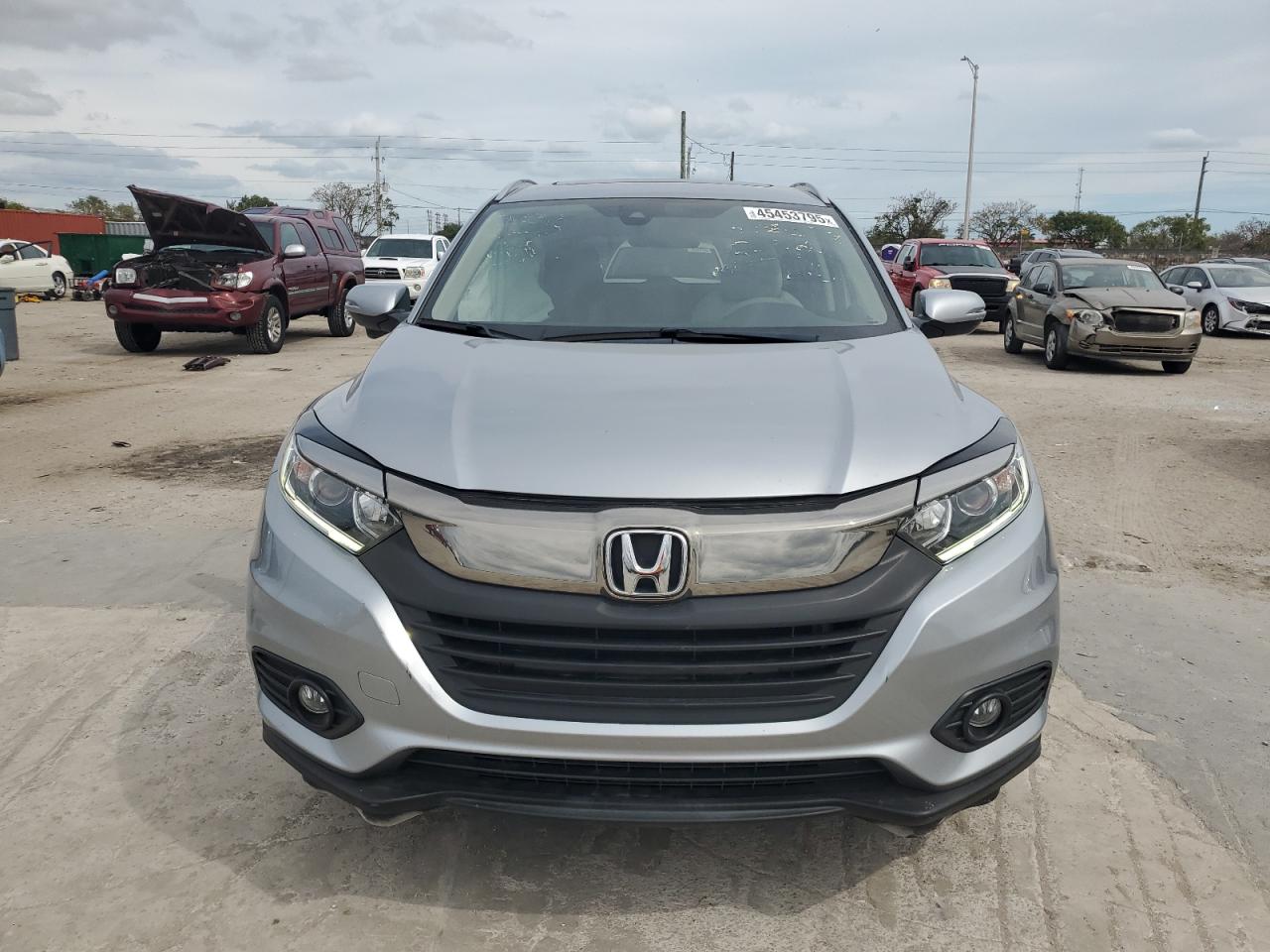 2020 Honda HR-V VIN 3CZRU5H57LM714406 Copart auction photo, side / rear end damage thumbnail 5