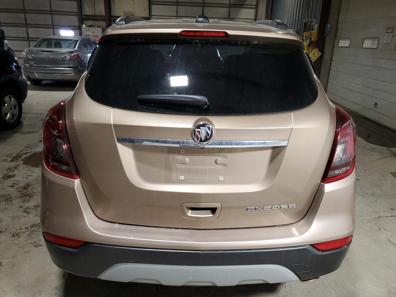 2019 Buick Encore VIN KL4CJASB6KB744699 Copart auction photo, side / undercarriage damage thumbnail 6