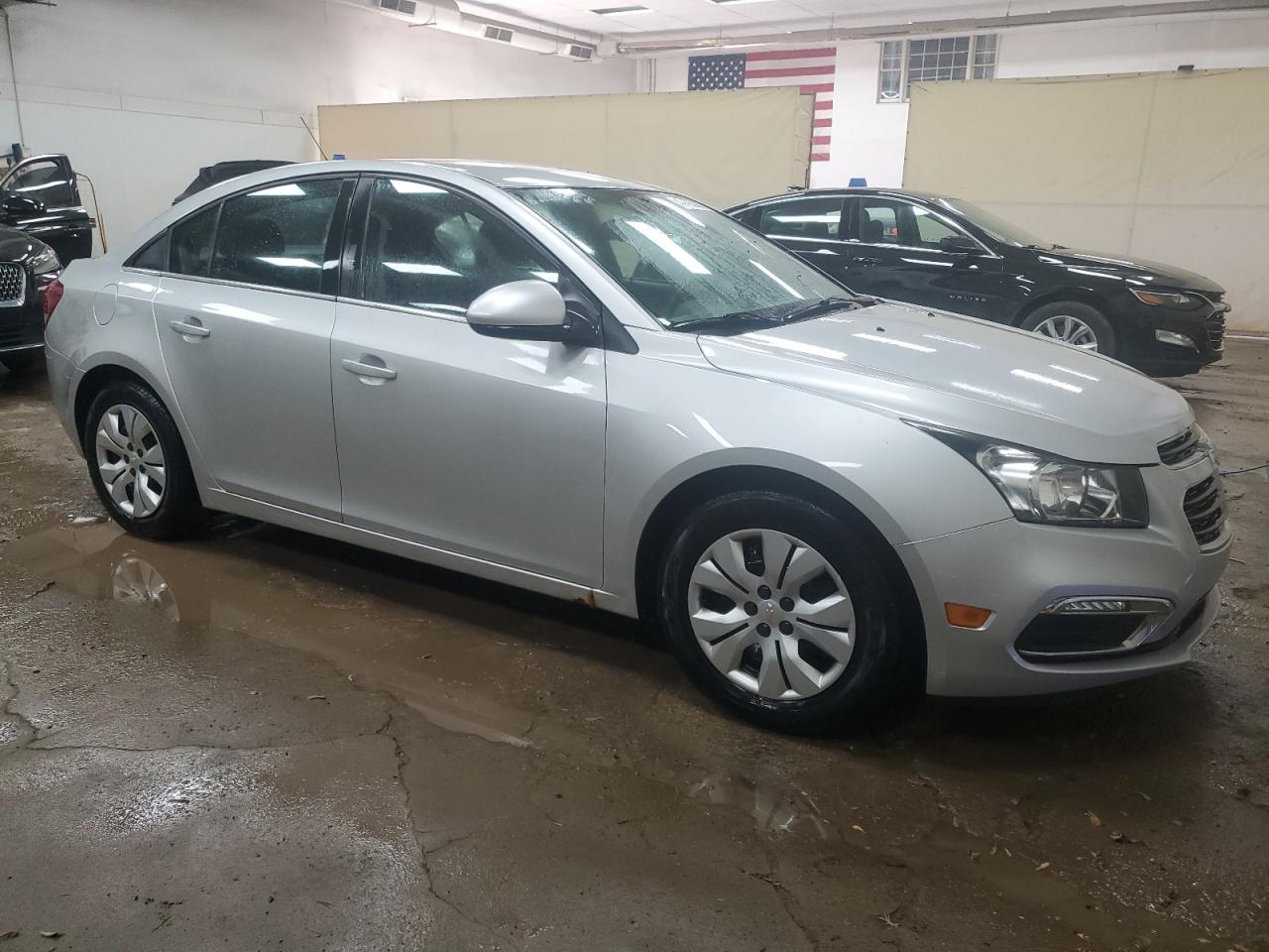 2015 Chevrolet Cruze VIN 1G1PC5SB0F7187394 Copart auction photo, side / front end damage thumbnail 4