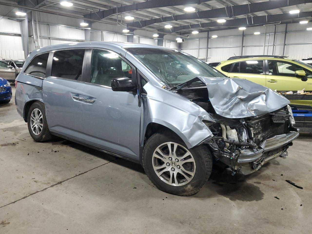 2012 Honda Odyssey VIN 5FNRL5H67CB022393 Copart auction photo, front end / side damage thumbnail 4