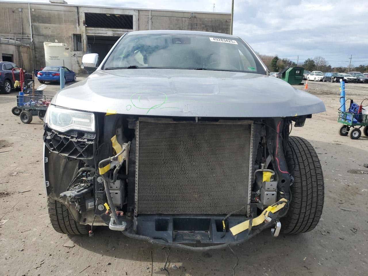 2016 Jeep Grand Cherokee VIN 1C4RJFCT6GC300552 Copart auction photo, front end / side damage thumbnail 5