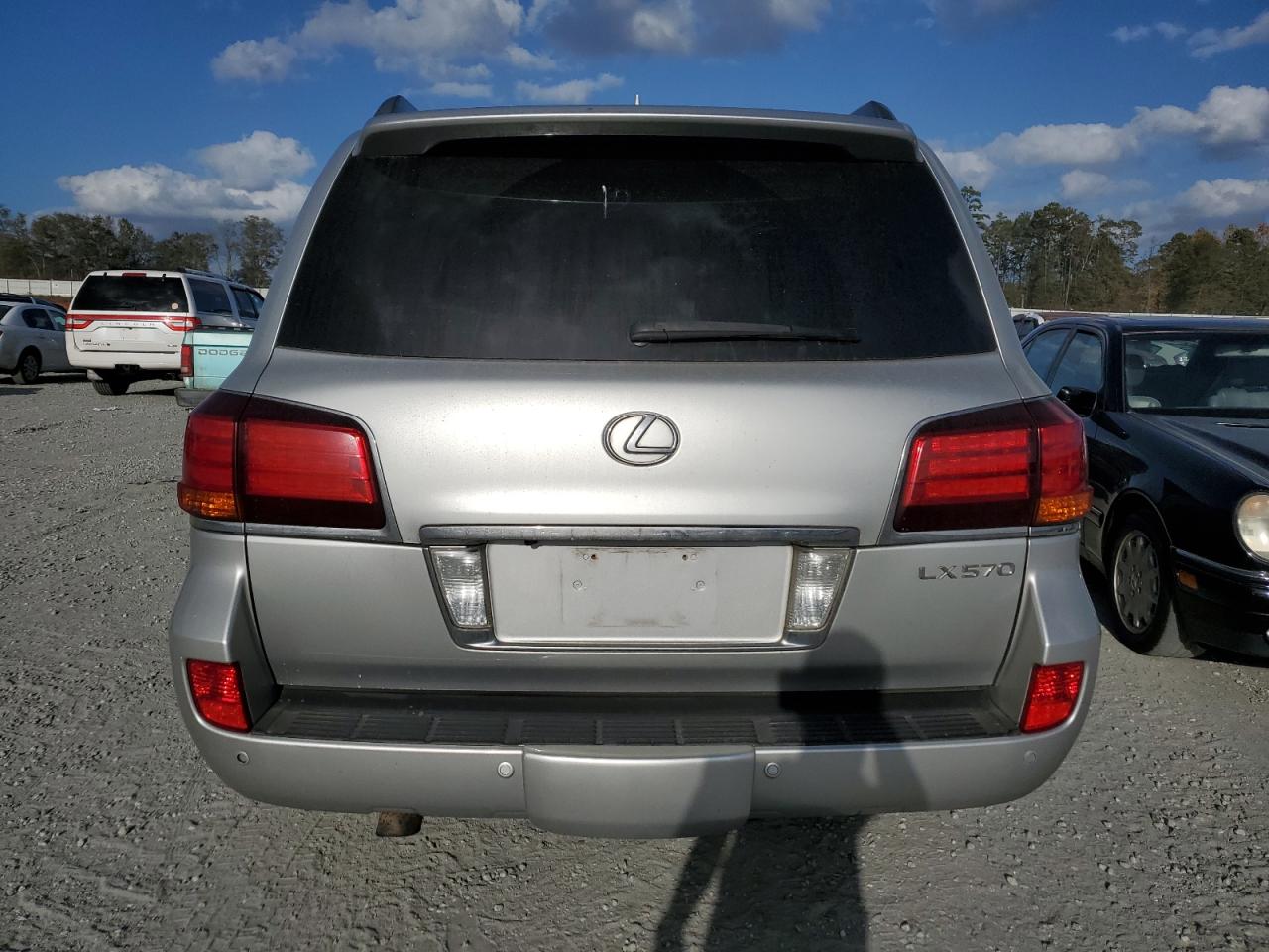 2011 Lexus LX VIN JTJHY7AX9B4076440 Copart auction photo, front end / minor dent/scratches damage thumbnail 6