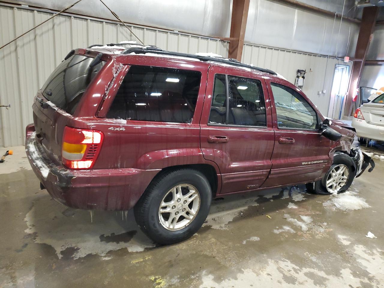 2000 Jeep Grand Cherokee VIN 1J4GW58NXYC403739 Copart auction photo, front end / undercarriage damage thumbnail 3