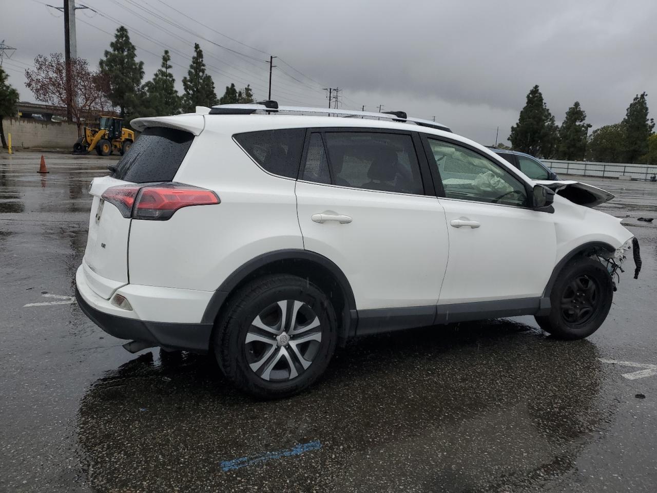 2016 Toyota RAV 4 VIN JTMZFREV1GJ081772 Copart auction photo, side / front end damage thumbnail 3