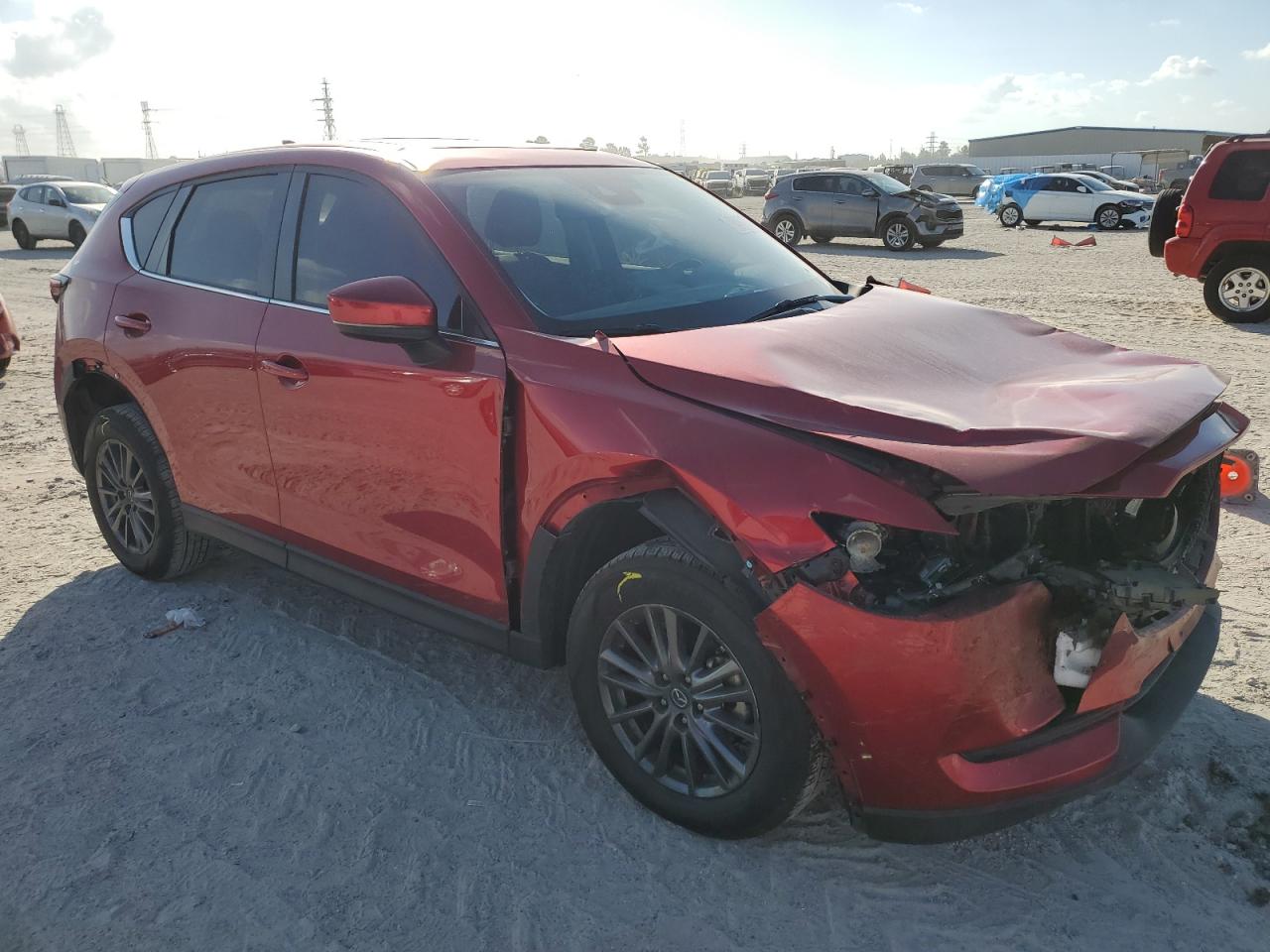 2021 Mazda CX-5 VIN JM3KFACM6M0418863 Copart auction photo, front end damage thumbnail 4
