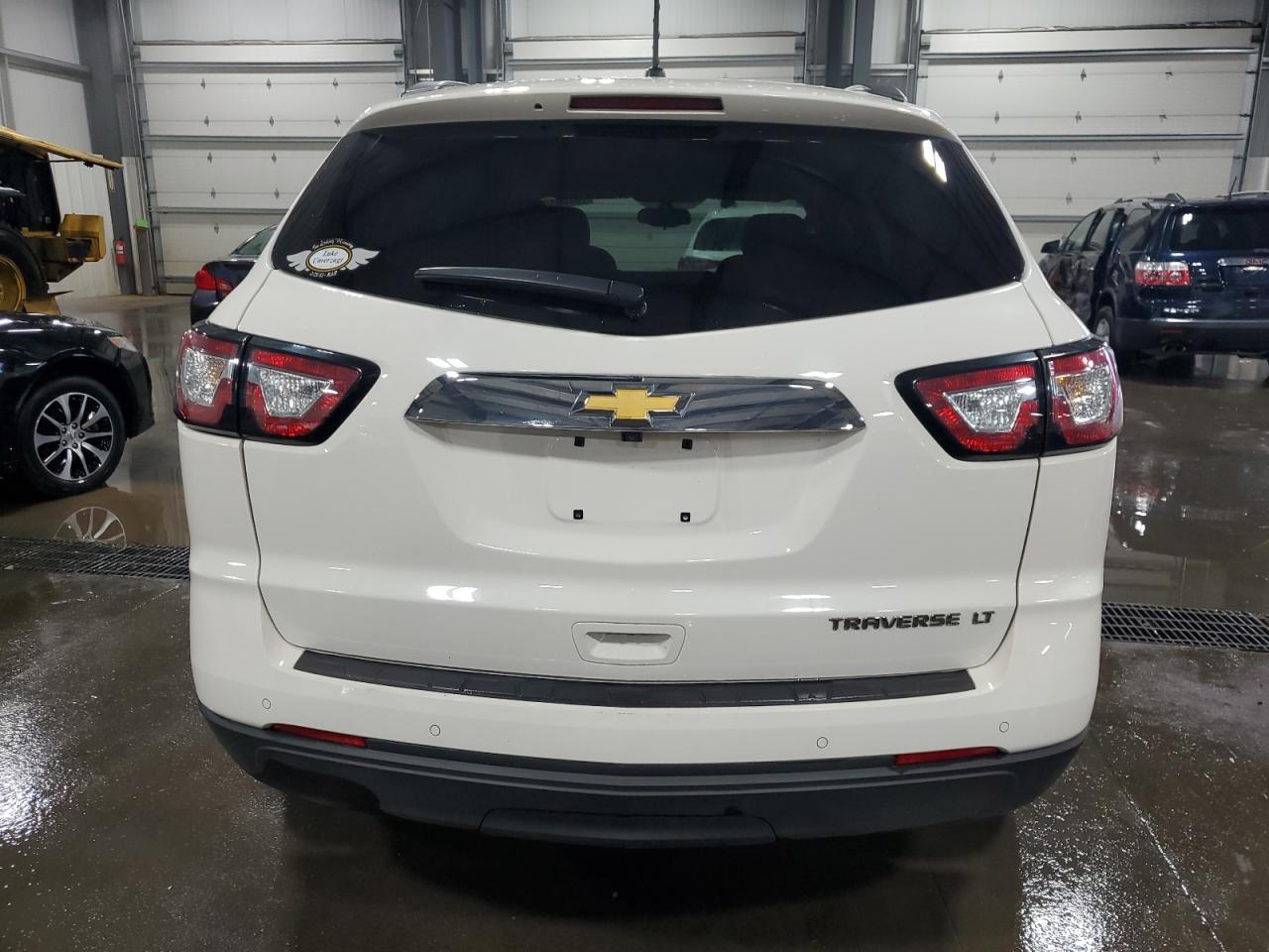 2015 Chevrolet Traverse VIN 1GNKRGKD1FJ244810 Copart auction photo, side / rear end damage thumbnail 6