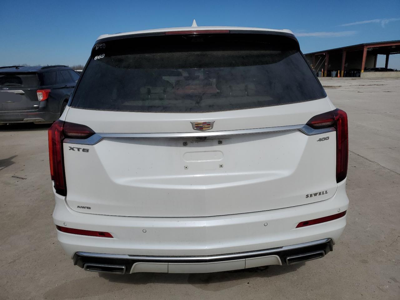2022 Cadillac XT6 VIN 1GYKPDRS4NZ148570 Copart auction photo, front end / rear end damage thumbnail 6