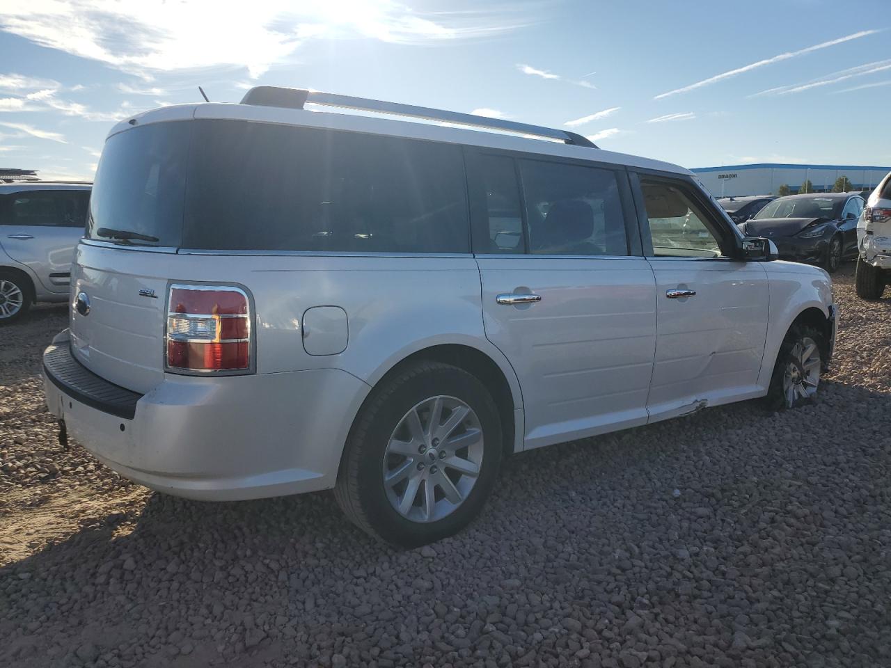 2011 Ford Flex VIN 2FMGK5CC5BBD20651 Copart auction photo, side / front end damage thumbnail 3
