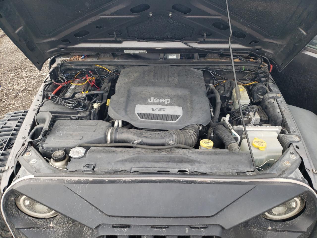 2014 Jeep Wrangler VIN 1C4BJWDG5EL282643 Copart auction photo, undercarriage / minor dent/scratches damage thumbnail 11
