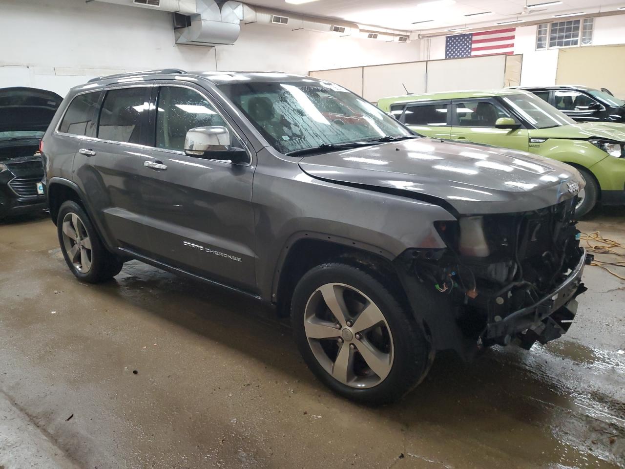 2015 Jeep Grand Cherokee VIN 1C4RJFBG8FC717884 Copart auction photo, front end / minor dent/scratches damage thumbnail 4