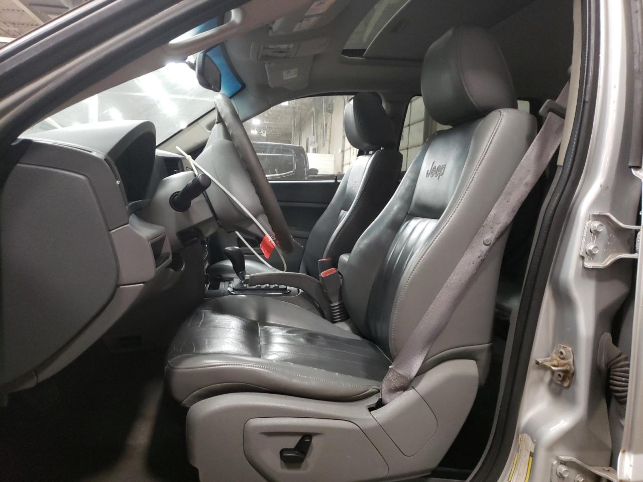 2007 Jeep Grand Cherokee VIN 1J8GR48K07C579977 Copart auction photo, rear end damage thumbnail 7