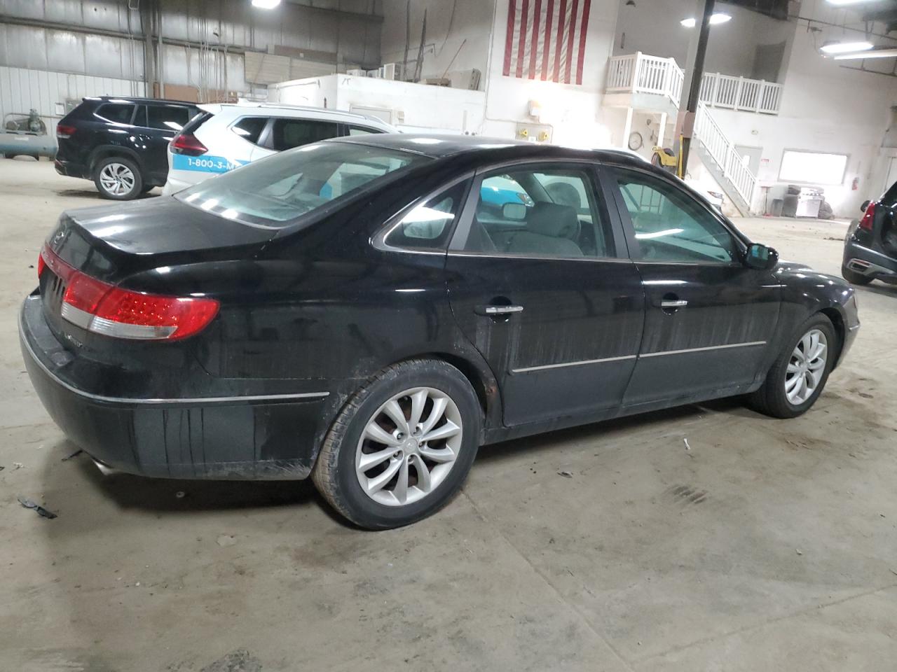 2006 Hyundai Azera VIN KMHFC46F66A100252 Copart auction photo, hail / front end damage thumbnail 3