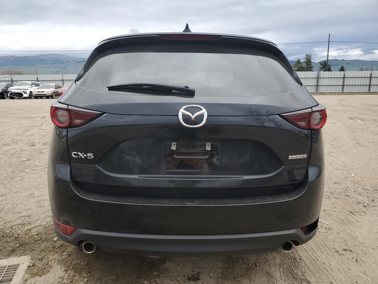 2021 Mazda CX-5 VIN JM3KFACM5M0314042 Copart auction photo, front end / side damage thumbnail 6