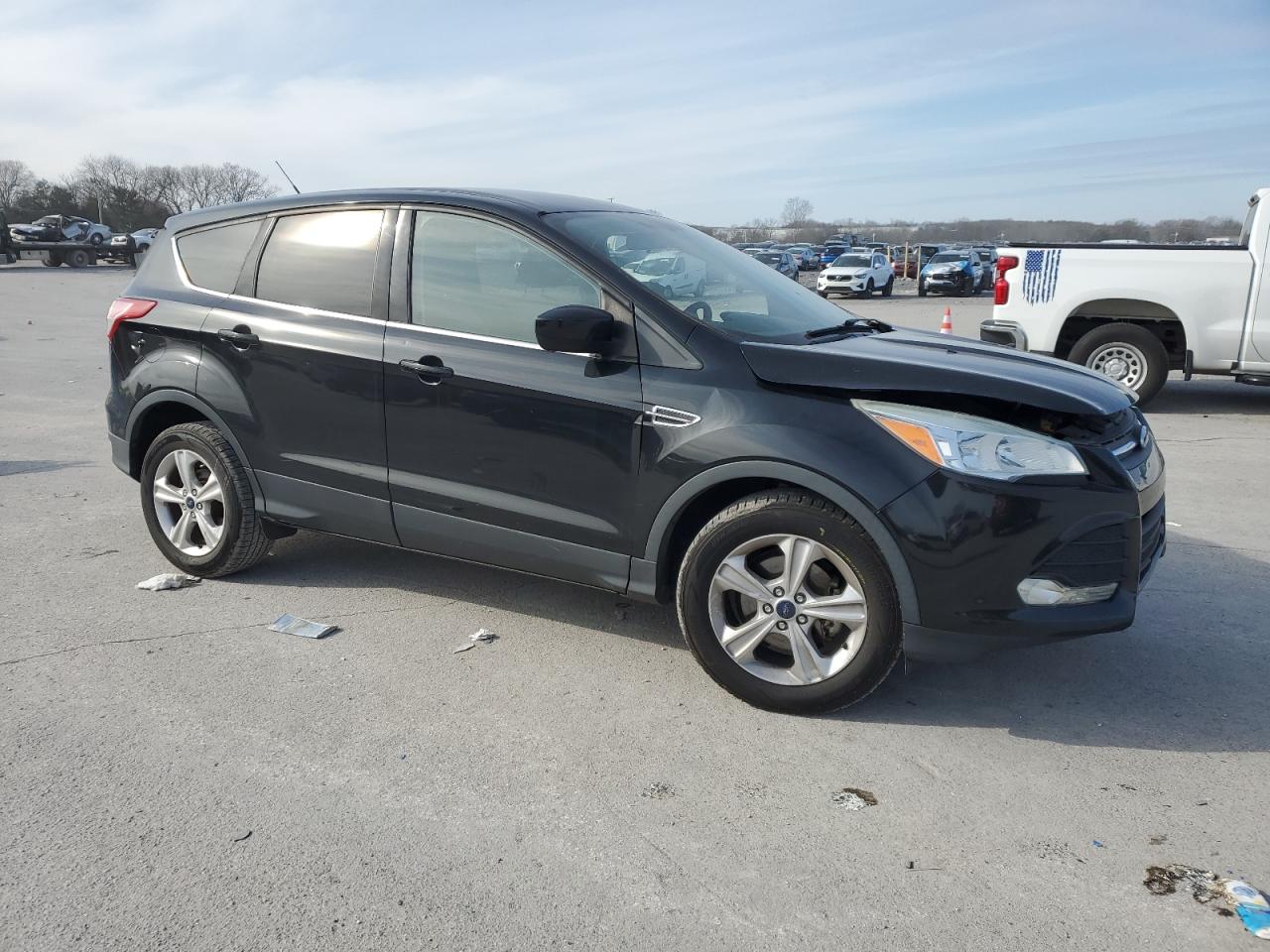 2015 Ford Escape VIN 1FMCU0GX1FUC23018 Copart auction photo, front end damage thumbnail 4