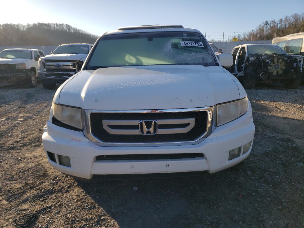 2011 Honda Ridgeline VIN 5FPYK1F52BB010305 Copart auction photo, front end damage thumbnail 5
