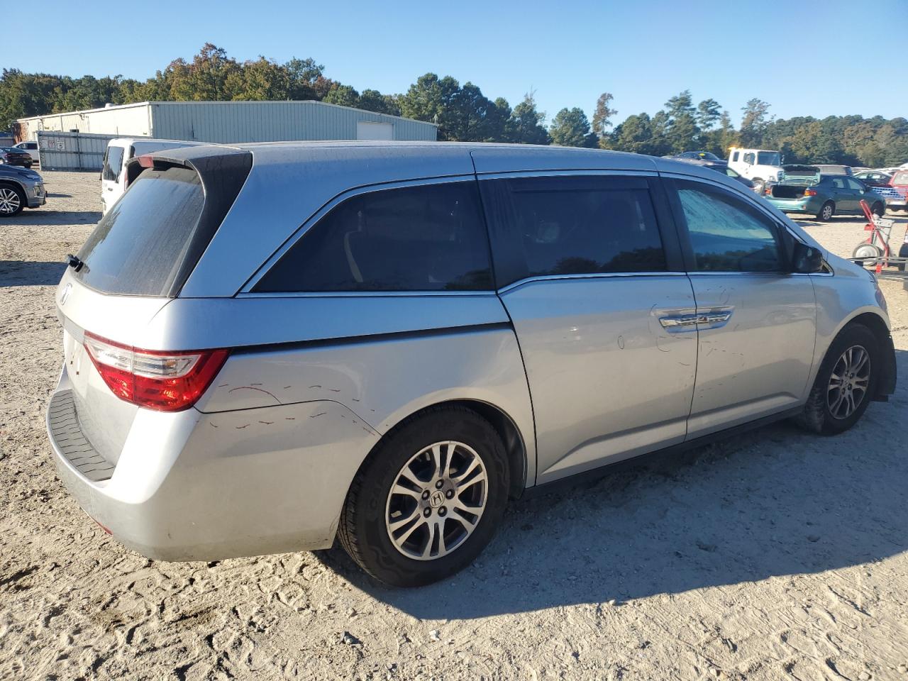 2012 Honda Odyssey VIN 5FNRL5H41CB067800 Copart auction photo, front end / minor dent/scratches damage thumbnail 3