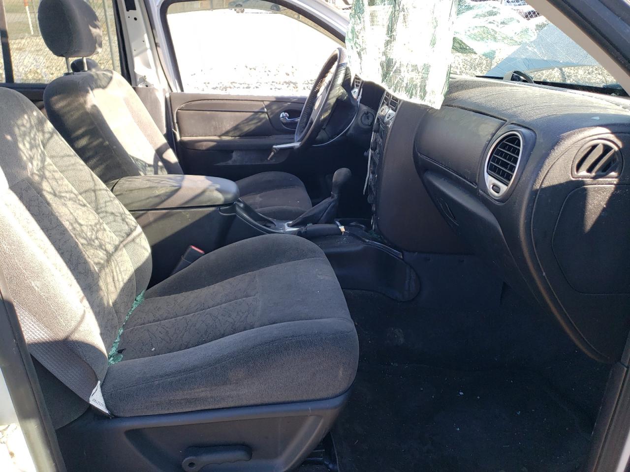 2005 GMC Envoy VIN 1GKDT13S252344795 Copart auction photo, top/roof / all over damage thumbnail 7