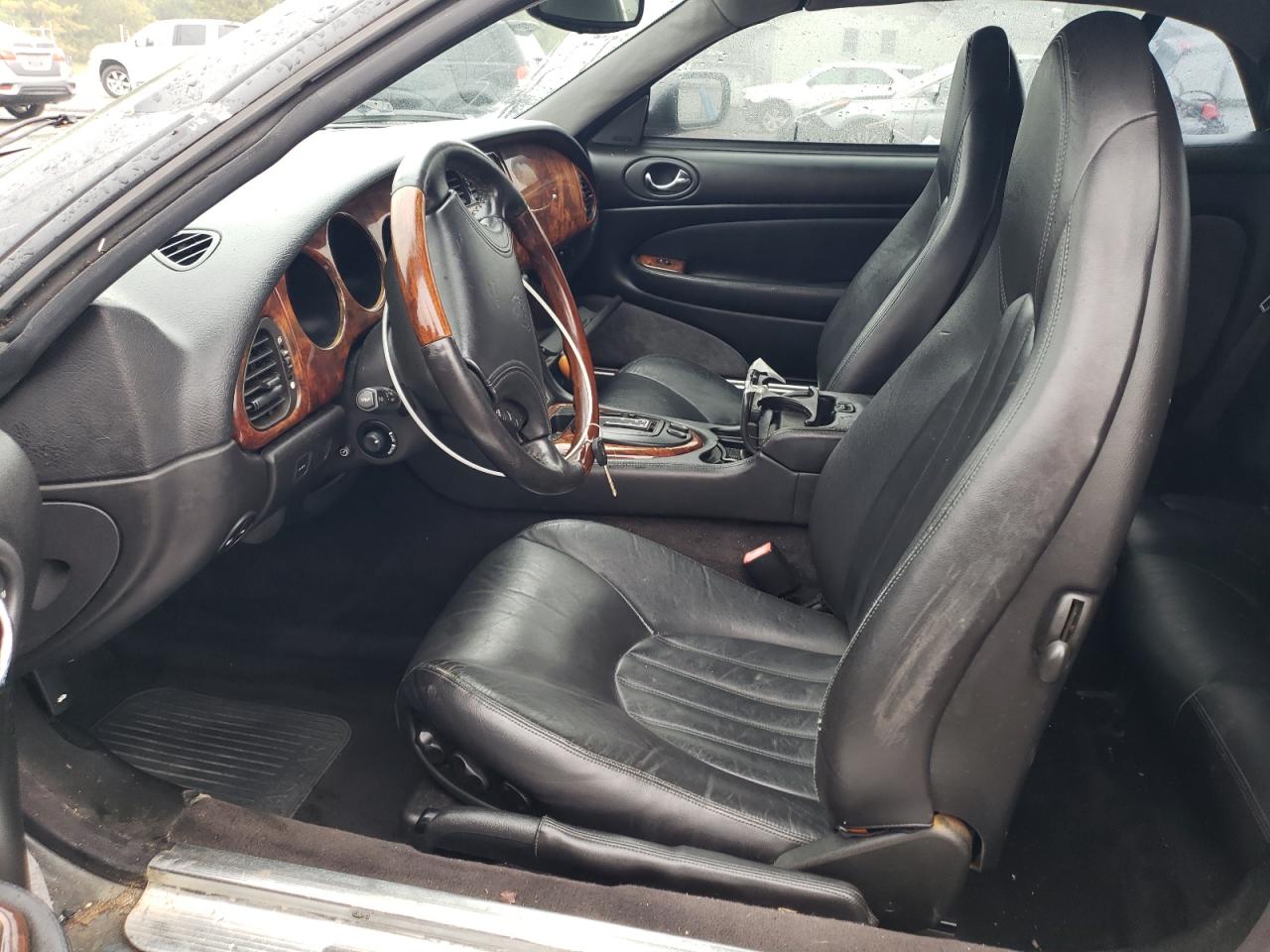 1997 Jaguar XK VIN SAJGX274XVC011755 Copart auction photo, side damage thumbnail 7