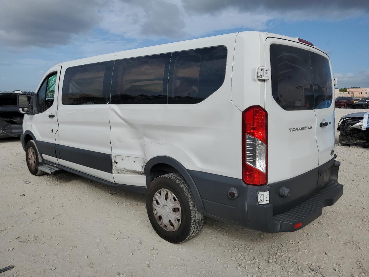 2018 Ford Transit VIN 1FBZX2ZM1JKB02714 Copart auction photo, side damage thumbnail 2
