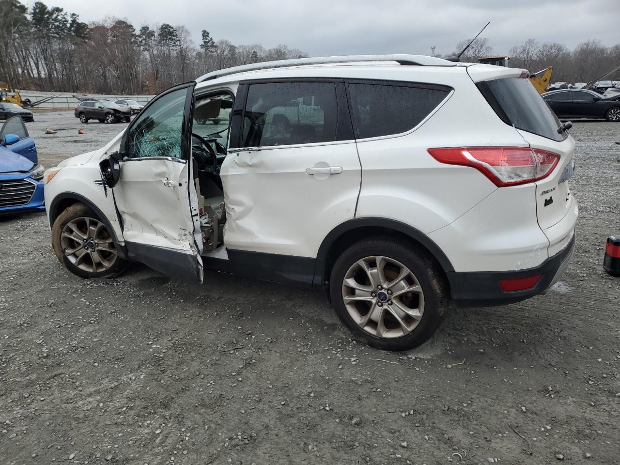 2016 Ford Escape VIN 1FMCU0JX5GUB19304 Copart auction photo, side damage thumbnail 2