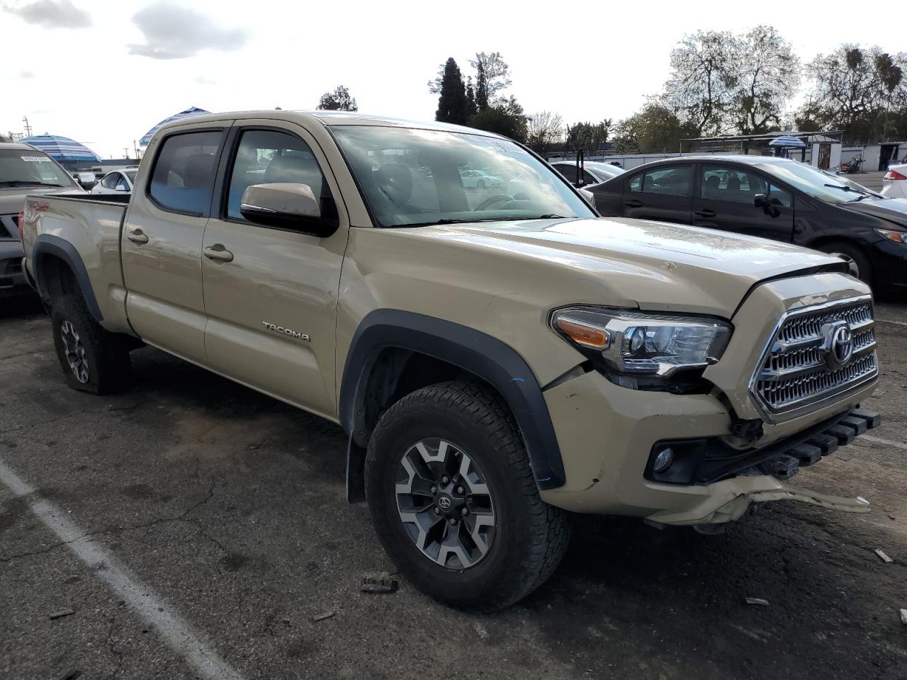 2016 Toyota Tacoma VIN 3TMDZ5BN2GM006127 Copart auction photo, front end / rear end damage thumbnail 4