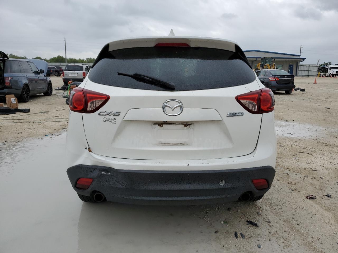 2014 Mazda CX-5 VIN JM3KE2CY2E0380593 Copart auction photo, water/flood / minor dent/scratches damage thumbnail 6